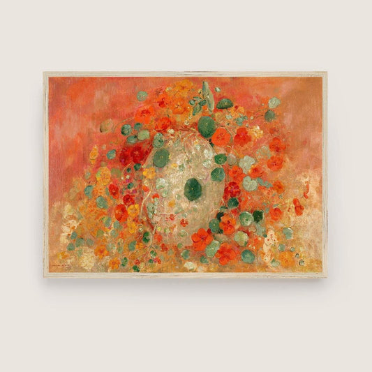 A fine art print of Odilon Redon's oil painting, Nasturtiums, from 1905. A lovely, cheerful print in reds and oranges. The print is displayed in a simple light wood picture frame.