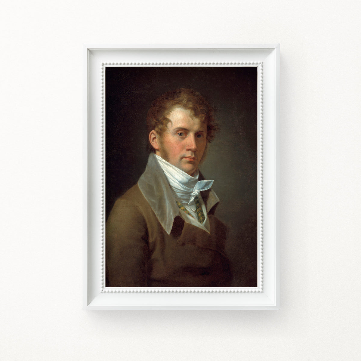 Framed portrait of a man with a white cravat, on a dark background