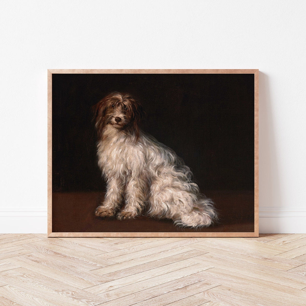 Framed artwork of a dog on a dark background in a room with wooden flooring.