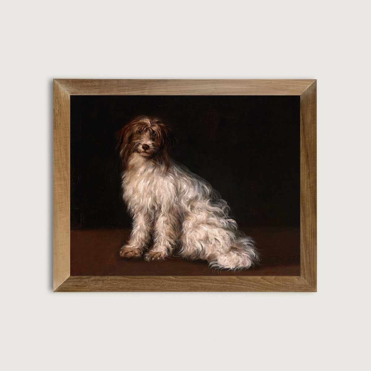 Framed art print of a dog sitting on a dark background in a wooden frame.