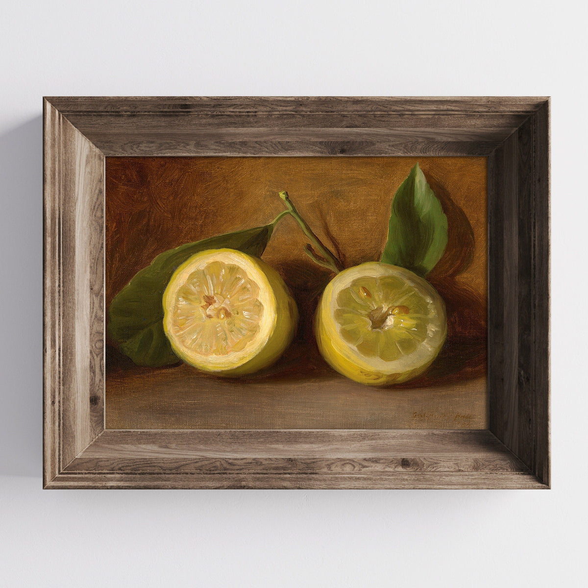 A fine art print of a 19th-century oil still-life painting of a halved lemon. The print is displayed in a wooden picture frame on a white wall.