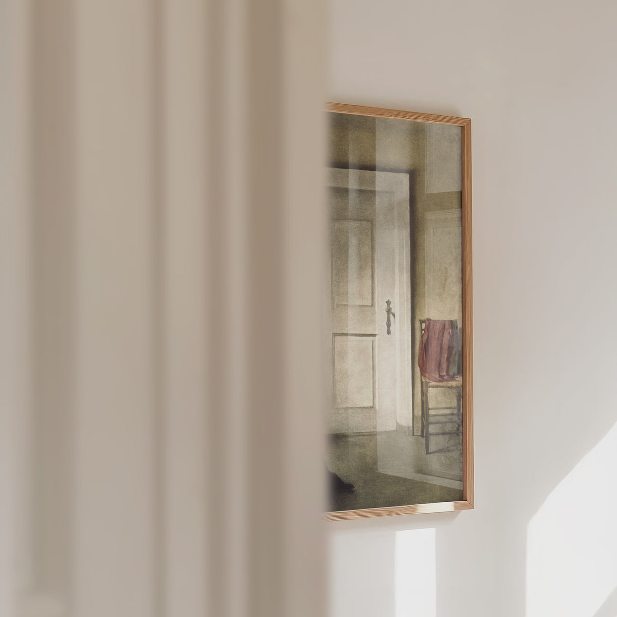 Video of a framed print of a lady reading panning across.