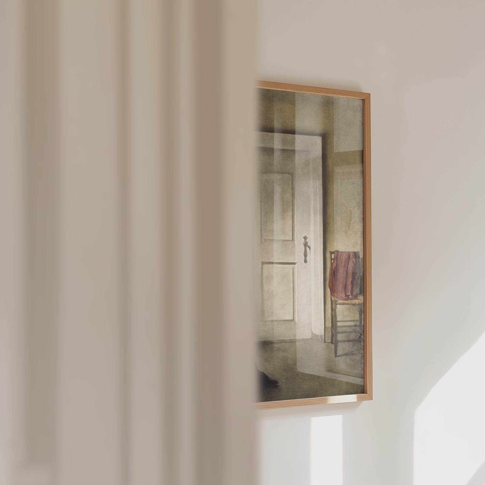Video of a framed print of a lady reading panning across.