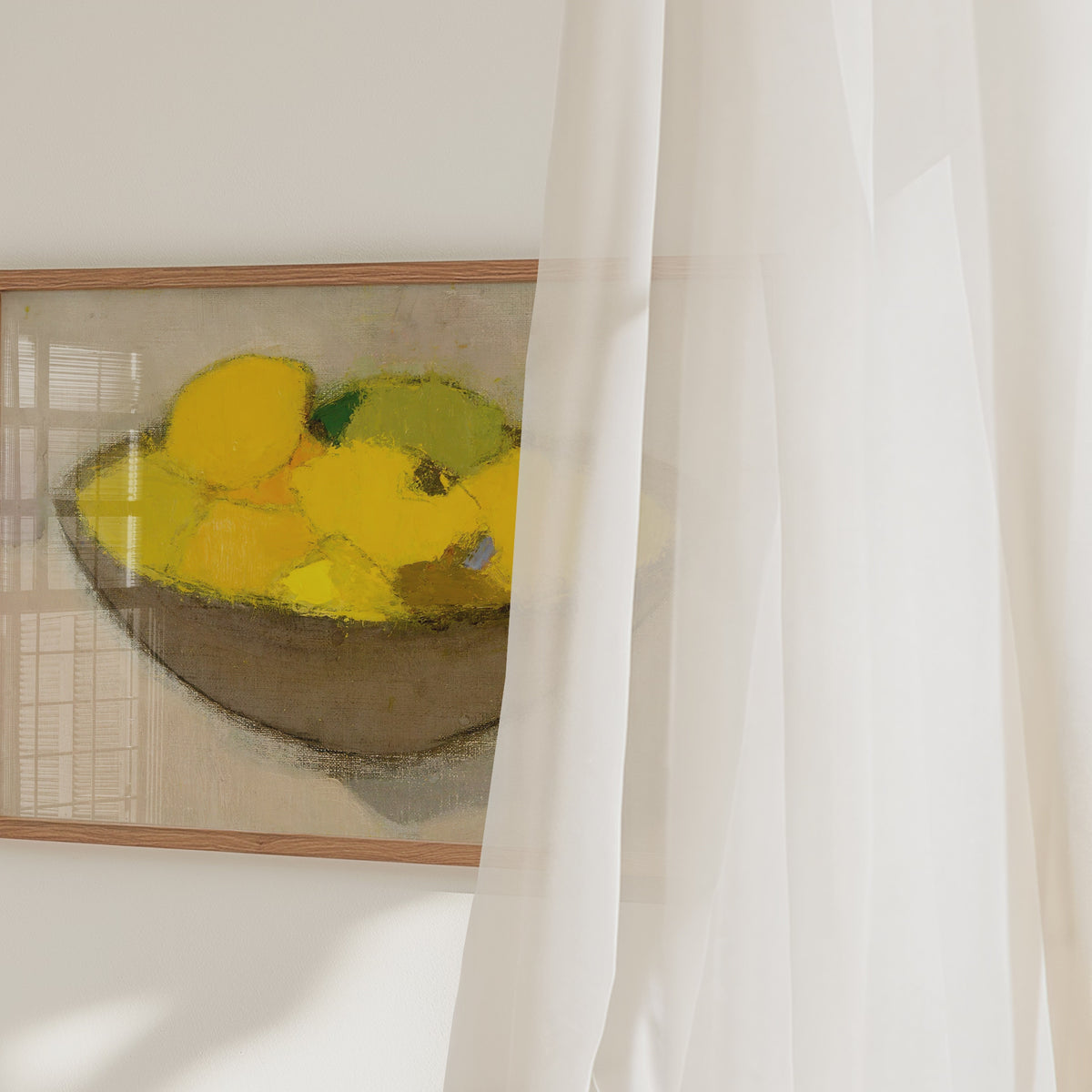 Video of a framed print of a bowl of lemons.