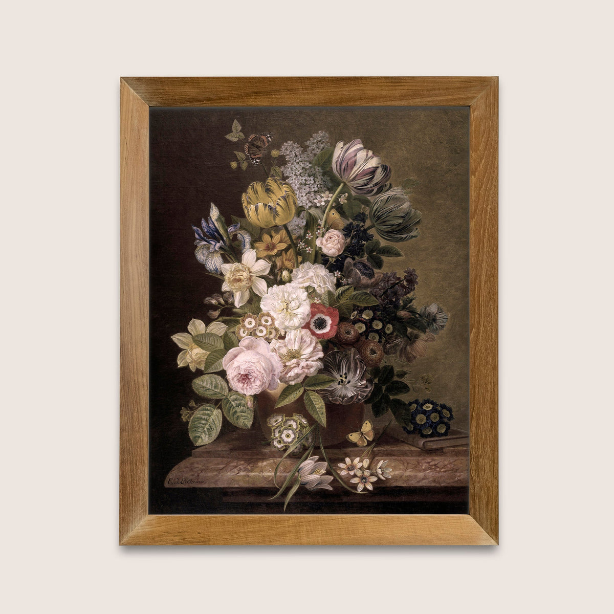 Framed print of a still life with flowers on a white wall.