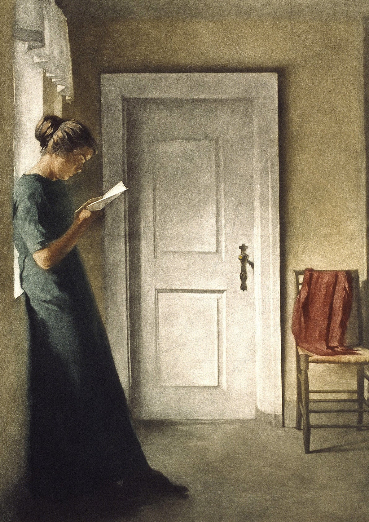 Fine art print of a lady reading by sunlight from the window behind her.